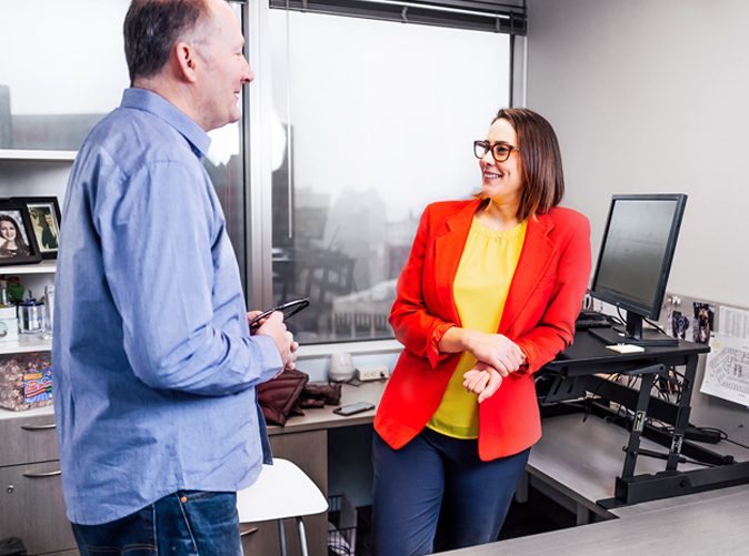 coworkers conversing at the office