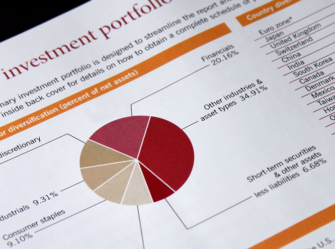 piece of paper showing investment portfolio with diversification chart