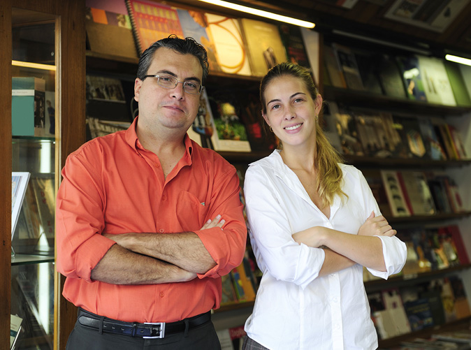 Man and woman standing in their place of business