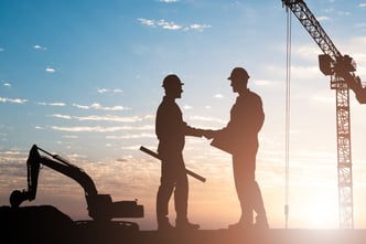 Architects Shaking Hands at Construction Site