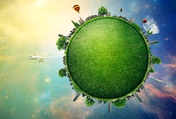 Green planet earth covered with grass city skyline. Sustainable source of electricity, power supply concept. Eco environmentally friendly technology approach. Elements of this image furnished by NASA-1