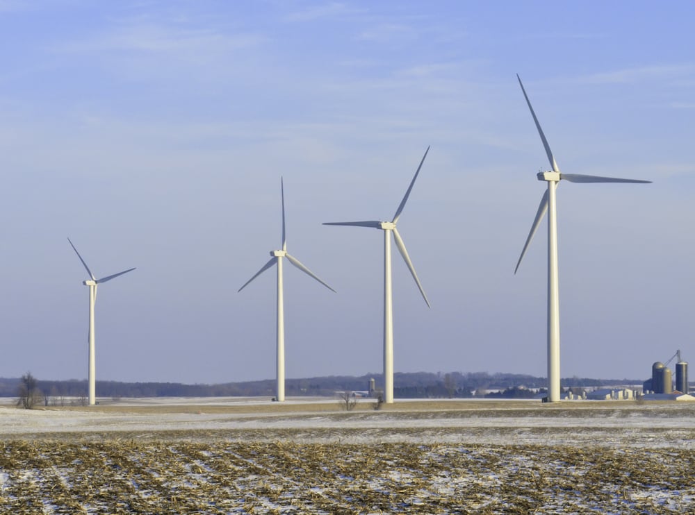 Rural skyscrapers Four wind turbines dominate snowy corn fields, Lee County, Illinois, in January