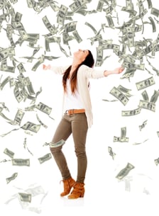 Excited woman under a money rain - isolated over a white background-1