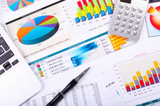 Financial paper charts and graphs on the table-3