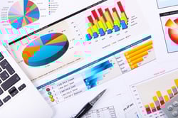 Graphs, charts, business table. The workplace of business people.