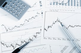 charts and graphs of sales of securities - workplace successful business man