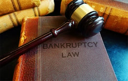 Bankruptcy law book and gavel