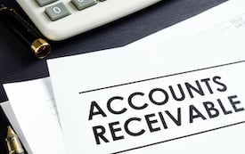Documents About Accounts Receivable, Pen and Calculator