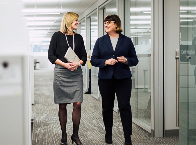 Meaden & Moore employees walking through the office