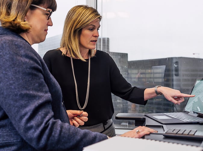 Meaden and Moore employees working at the office