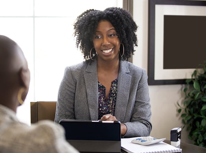 Tax Advisor talking with client at the office