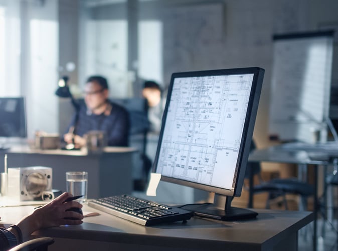 computer on desk in an office